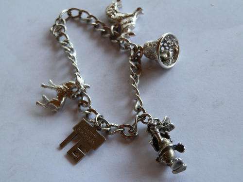 Heavy (25.4 g) charm brcelet - thirty (30) days to pay