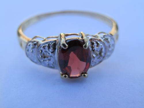New 9 ct gold garnet and diamond ring - thirty (30) days to pay