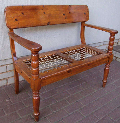 Old two-seater riempiesbank riempies chair
