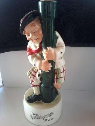 ANTIQUES AND COLLECTBLES-VINTAGE DRUNK SCOTSMAN MUSIC DECANTER
