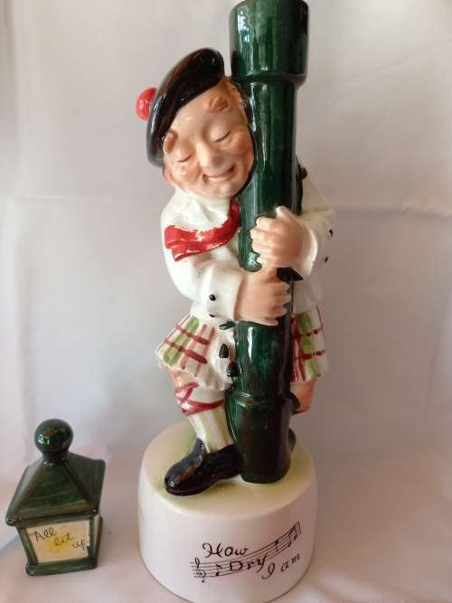 ANTIQUES AND COLLECTBLES-VINTAGE DRUNK SCOTSMAN MUSIC DECANTER