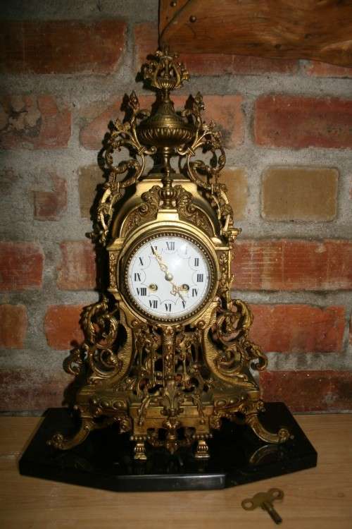 Solid brass French Mantelclock on marble base