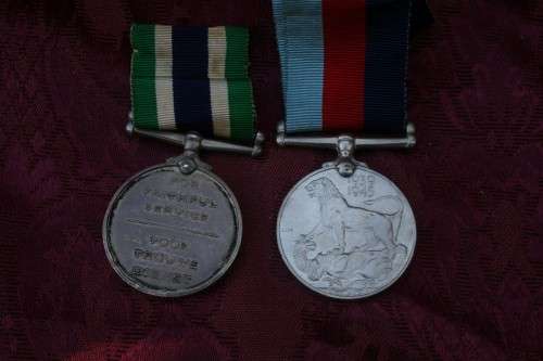 Medals issued to father and daughter.