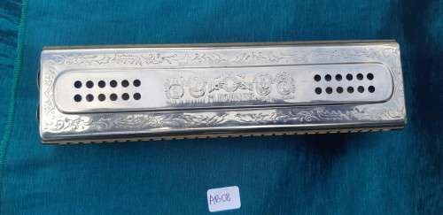 The Echo Harp . Bell metal Reeds C and G