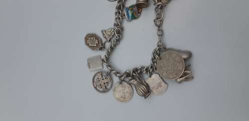 Charm Bracelet 92.5 silver with  17 charms