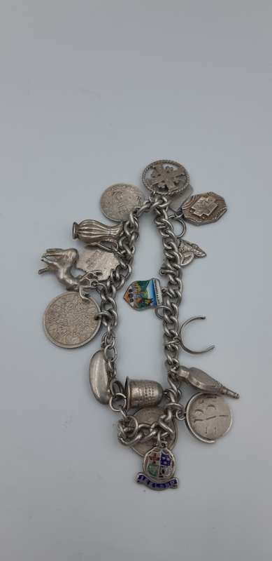Charm Bracelet 92.5 silver with  17 charms