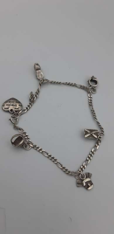Charm Bracelet 92.5 silver with  7 charms
