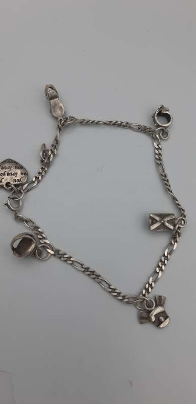 Charm Bracelet 92.5 silver with  7 charms