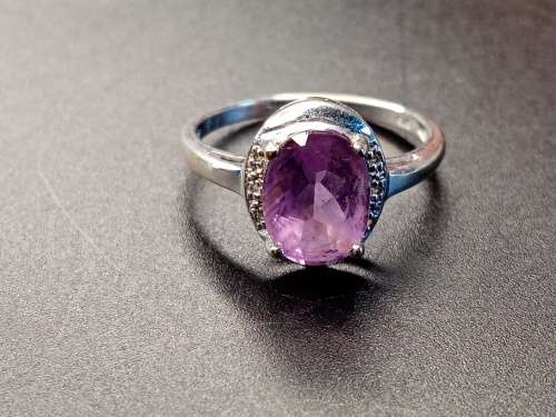 Ladies white gold with purple stone 17mm inside diameter  No Box!