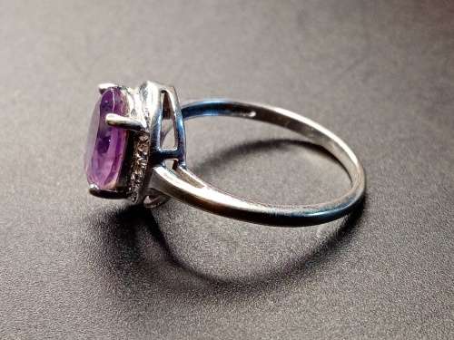 Ladies white gold with purple stone 17mm inside diameter  No Box!