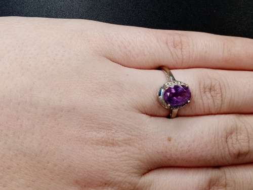 Ladies white gold with purple stone 17mm inside diameter  No Box!