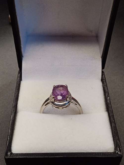 Ladies white gold with purple stone 17mm inside diameter  No Box!