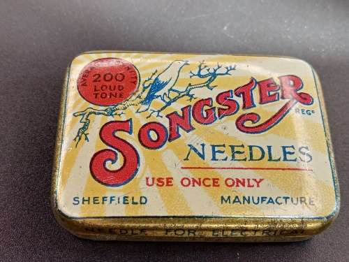 Wind up gramaphone needles in tin