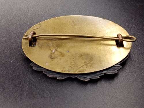 Brass badge