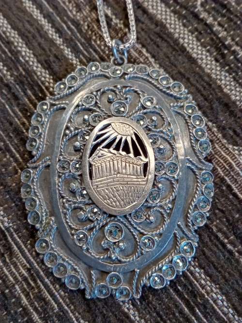 Sterling silver and gold pendant on chain