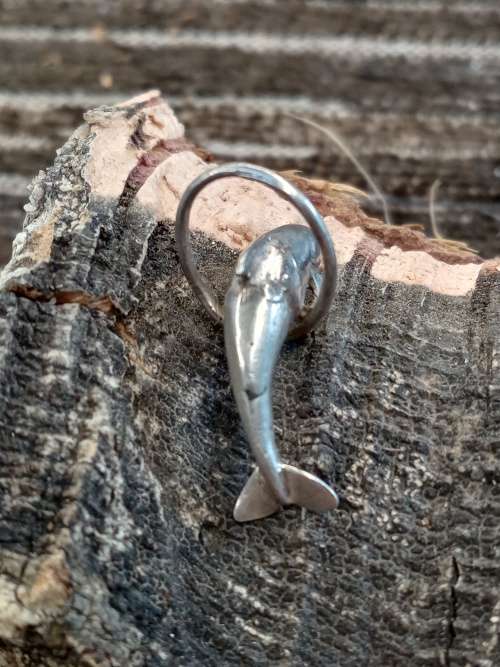 Sterling silver dolphin charm