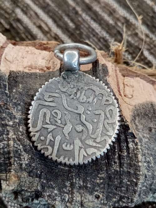 Ancient coin turned into pendant