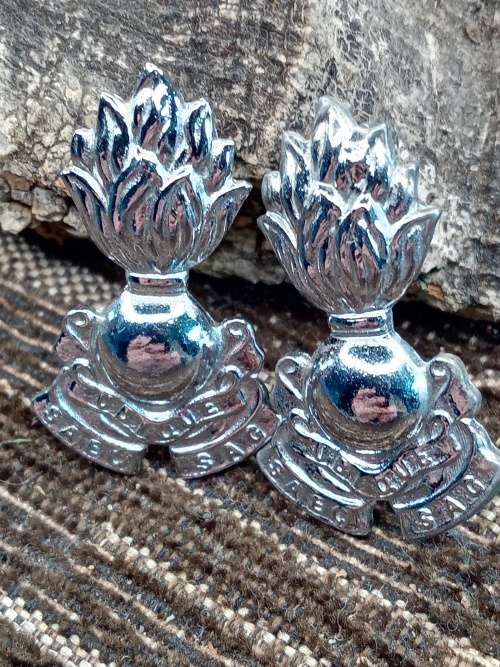 2 military insignia badges