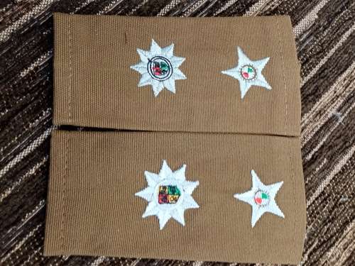 Nuetria cloth shoulder ranks