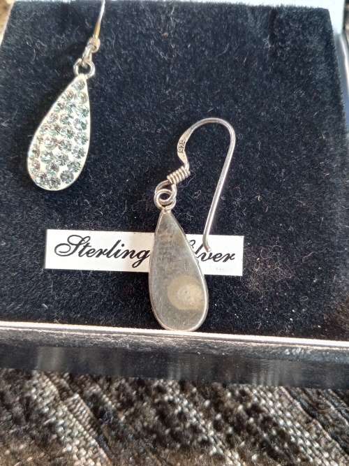 Sterling silver earrings in box