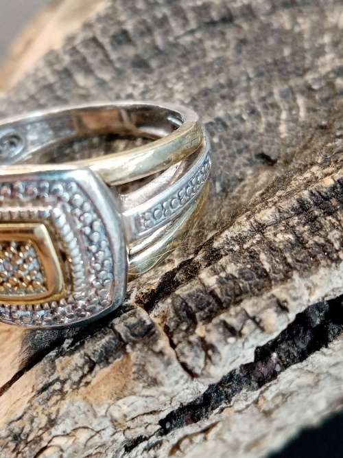 Sterling silver and 9ct gold ring Size L
