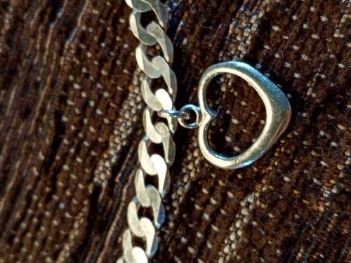 Charm bracelet with 4 charms 20.7 cm long