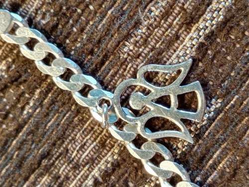Charm bracelet with 4 charms 20.7 cm long
