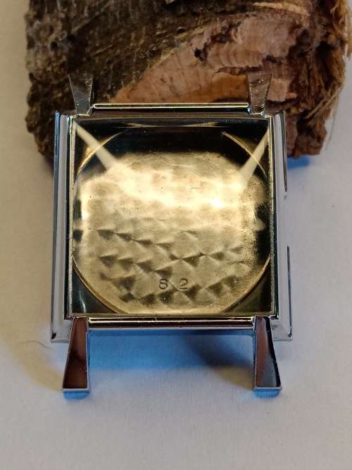 Square new old stock watch cases length: 26mm width: 27mm crystal intact
