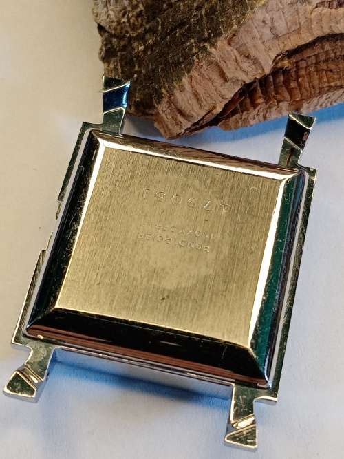 Square new old stock watch cases length: 26mm width: 27mm crystal intact