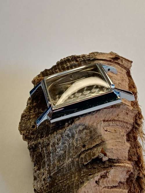 Square new old stock watch cases length: 26mm width: 27mm crystal intact