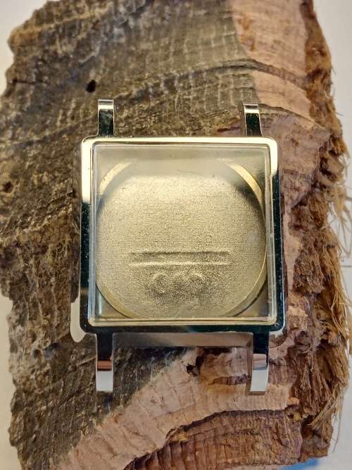 Square new old stock watch cases length: 22mm width: 23mm crystal intact
