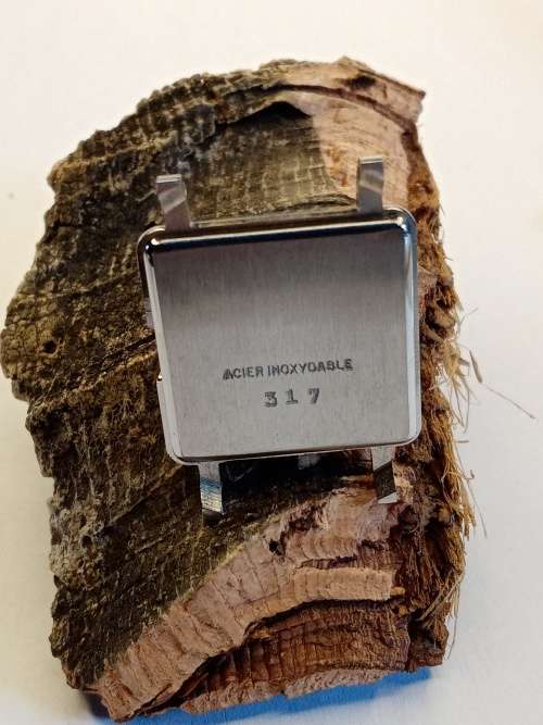 Square new old stock watch cases length: 22mm width: 23mm crystal intact
