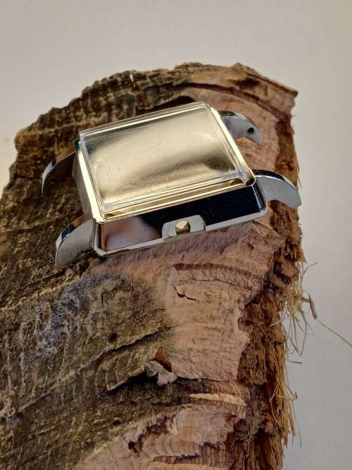 Square new old stock watch cases length: 22mm width: 23mm crystal intact