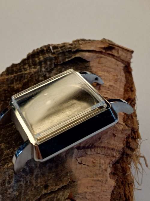 Square new old stock watch cases length: 22mm width: 23mm crystal intact