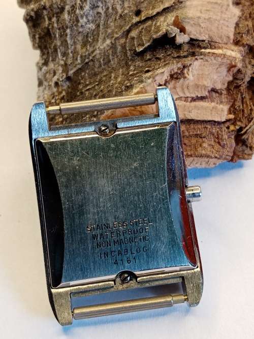 Square new old stock watch cases length: 26mm width: 24mm crystal intact