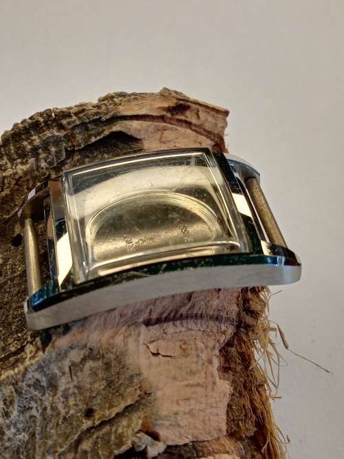 Square new old stock watch cases length: 26mm width: 24mm crystal intact