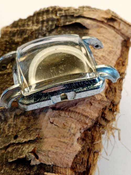 Square new old stock watch cases length: 24mm width: 23mm crystal intact