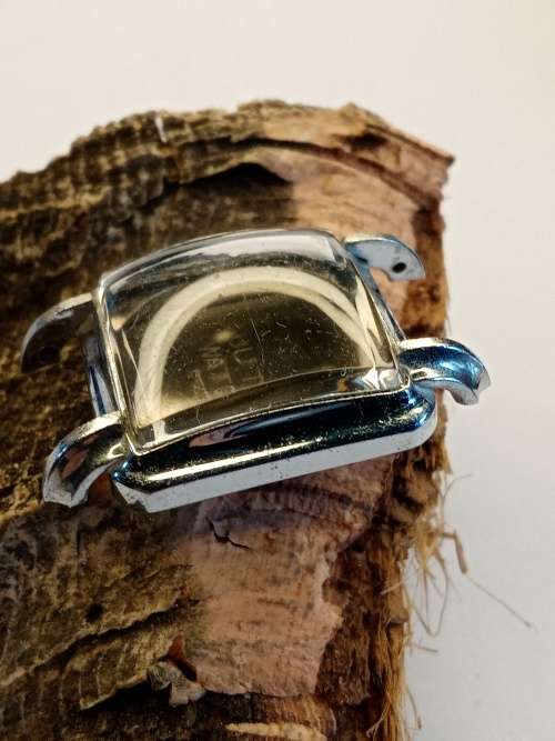 Square new old stock watch cases length: 24mm width: 23mm crystal intact