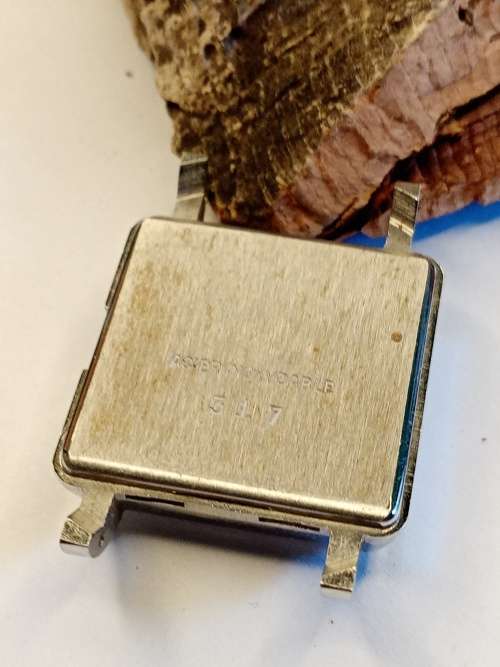 Square new old stock watch cases 23mm crystal intact