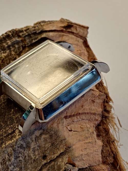 Square new old stock watch cases 23mm crystal intact