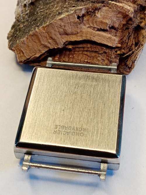 Square new old stock watch cases 26mm crystal intact