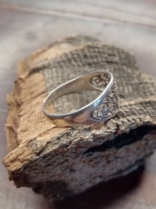 Sterling silver ladies ring Size: O.5 NO BOX!