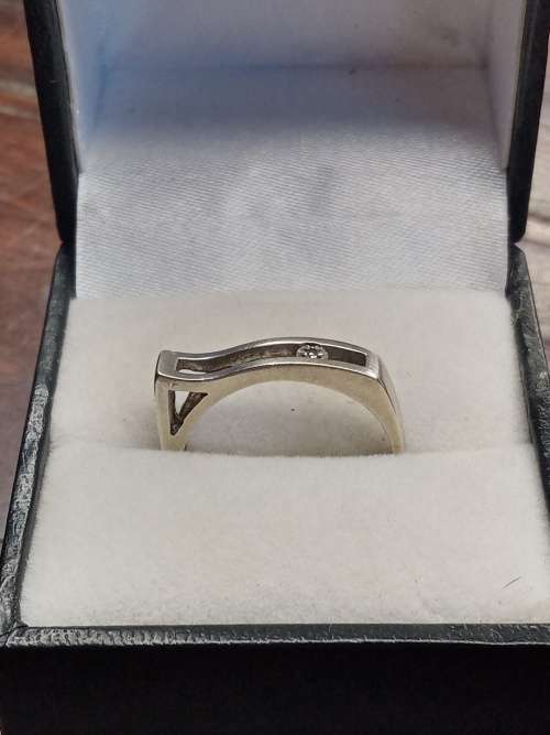 Sterling silver ladies ring Size: O.5 NO BOX!