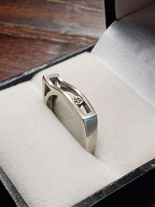 Sterling silver ladies ring Size: O.5 NO BOX!
