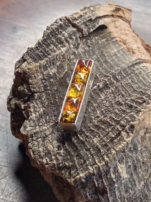 Amber sterling silver pendant 21mm by 0.5mm