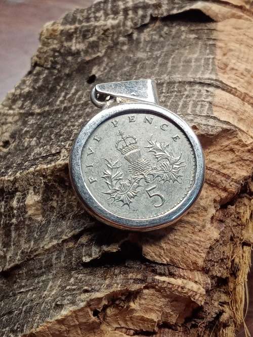 five pence made into pendant