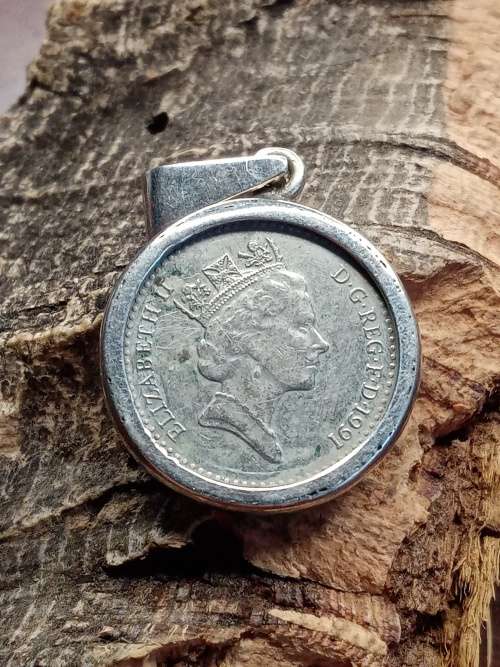 five pence made into pendant