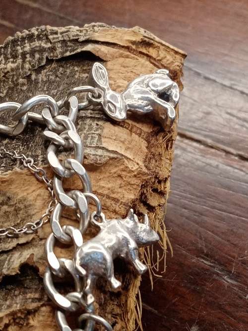 Sterling silver heavy charm bracelet 11 solid charms 265mm long
