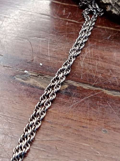 Sterling silver necklace with mother of pearl pendant size: 38mm by 26mm necklace length: 660mm