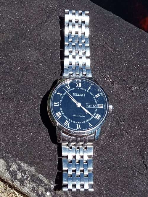 Seiko model number: 4R36 04E0 Automatic hacking and handwind 39mm ex crown